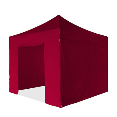 Grande tente à parois solides de Tentes Tempo avec parois latérales et porte, de 10 pied de large, vue de face, avec une toile rouge.